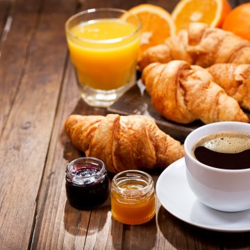 white cup of coffee croissants orange juice drip coffee makers
